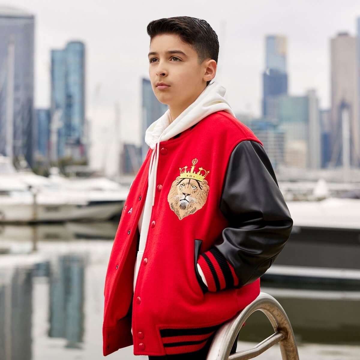 Sikh boy wearing red jacket